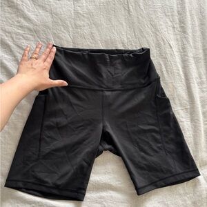 Lululemon Black High-Waist Bike Shorts with Side Pockets and back runners pocket